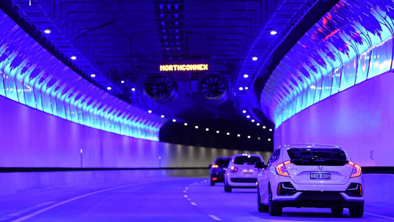 Cars drive through NorthConnex tunnel