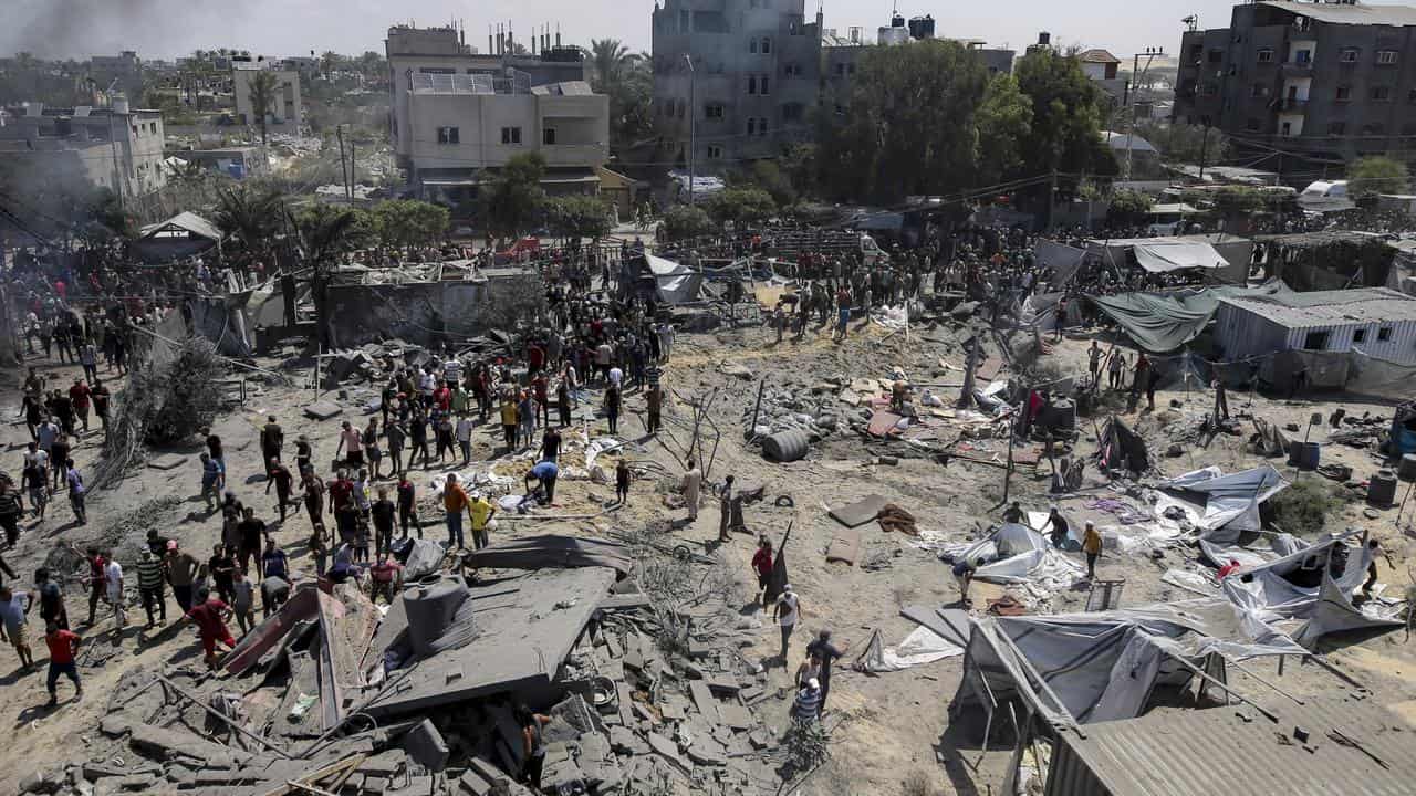 Palestinians after an Israeli bombardment on Khan Younis