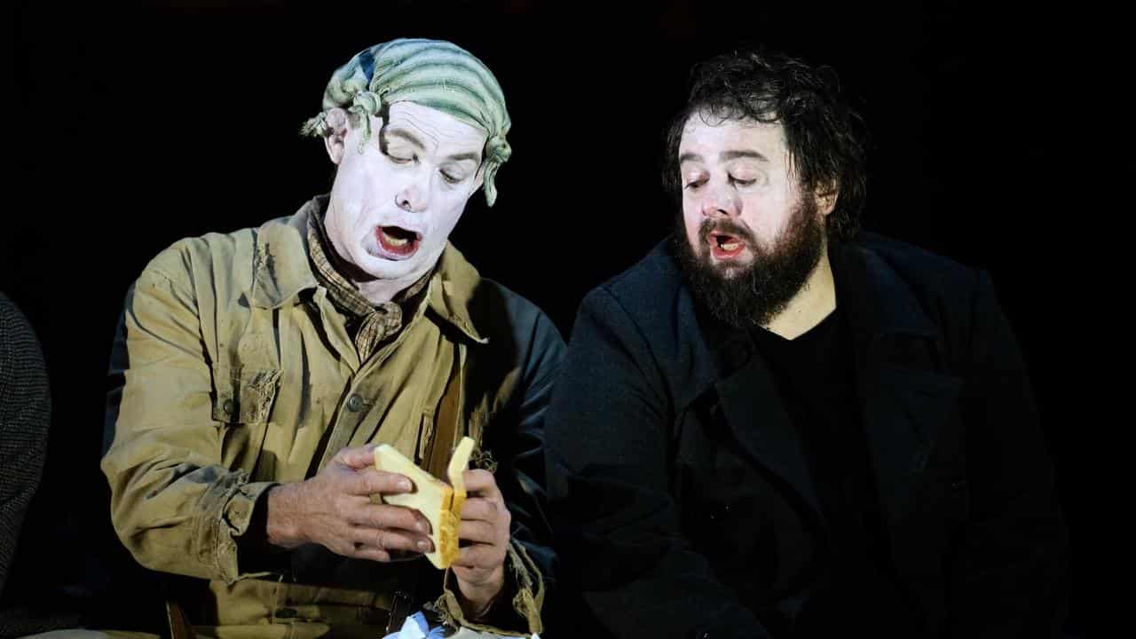 Jud Arthur as the gravedigger and Allan Clayton as Hamlet.