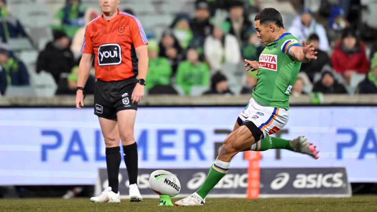 Jamal Fogarty kicks a goal.