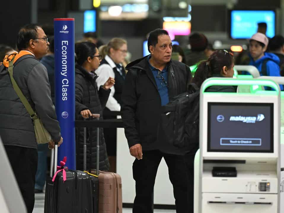 Travellers at the International terminal at Melbourne Airport