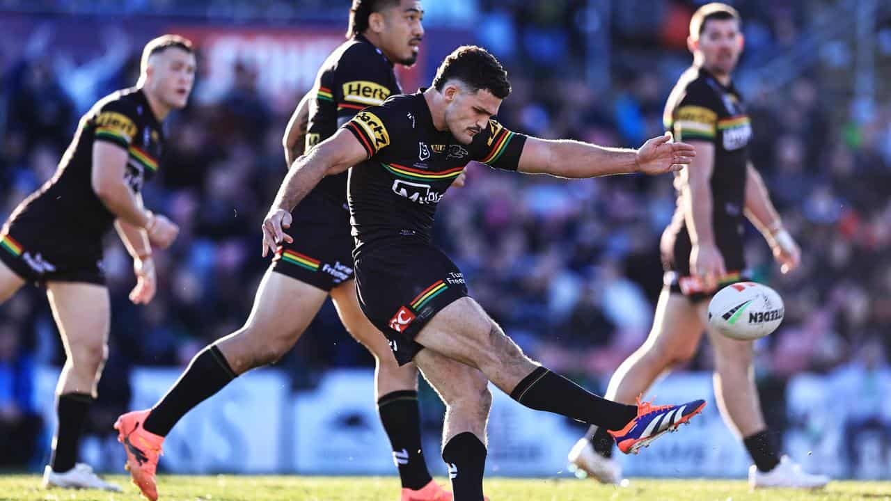 Nathan Cleary kicks his match-winning field goal.