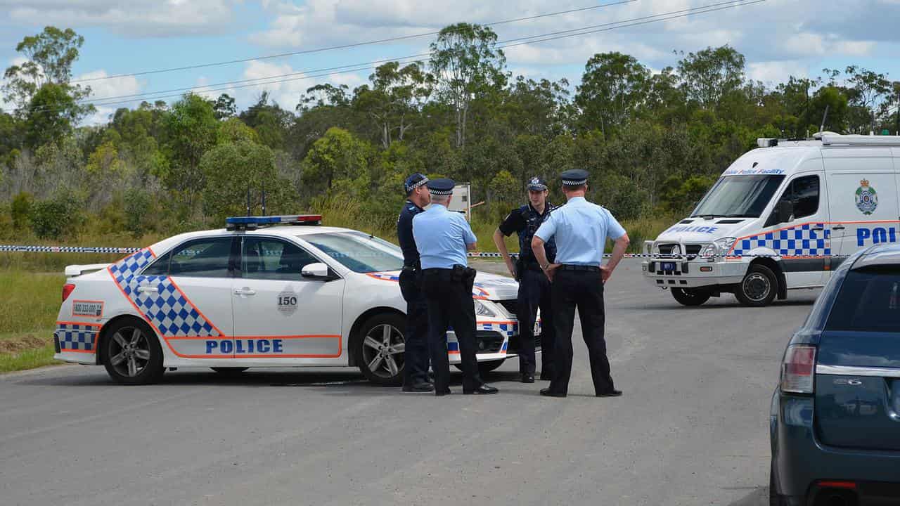 Police at the crime scene near bushland in Kingston (file image)