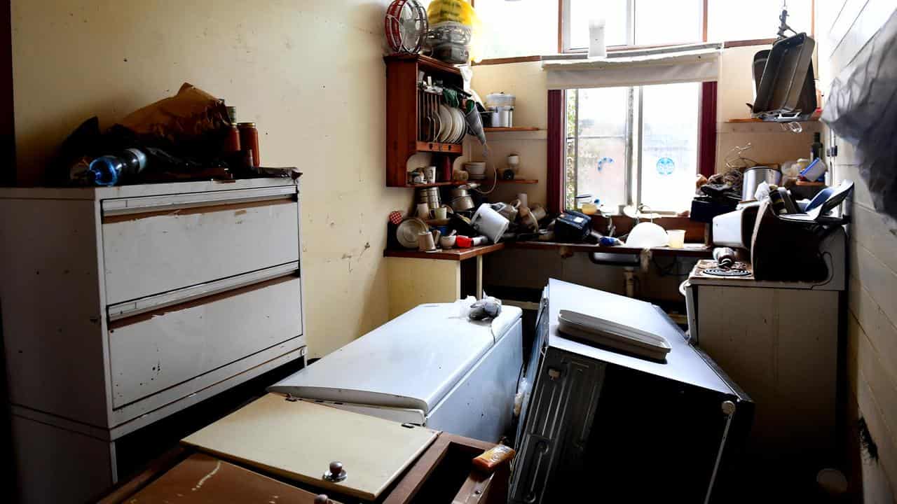 Inside a house that has been flooded.