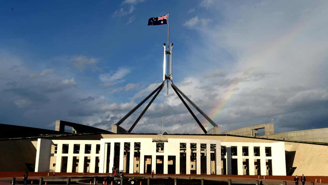 A partial rainbow outside Australian Parliament House, in Canberra