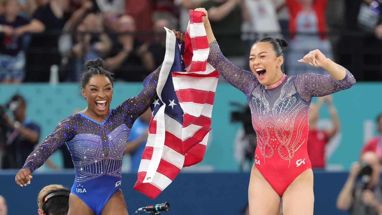 Simone Biles and Sunisa Lee