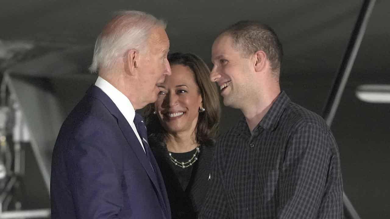 President Joe Biden, Vice-President Kamala Harris and Evan Gershkovich