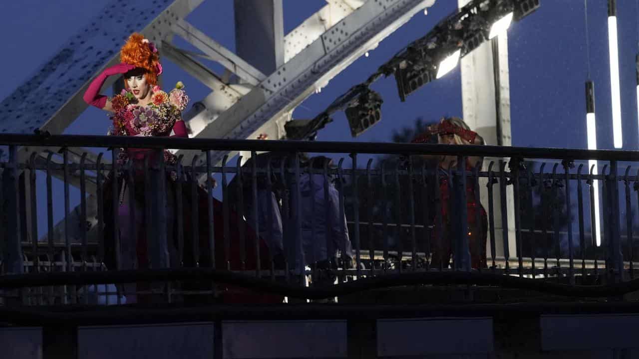 A drag queen preparing to perform at the opening ceremony 