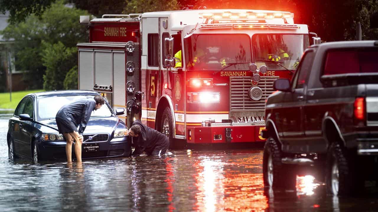 A stranded vehicle during Tropical Storm Debby in Savannah, Georgia