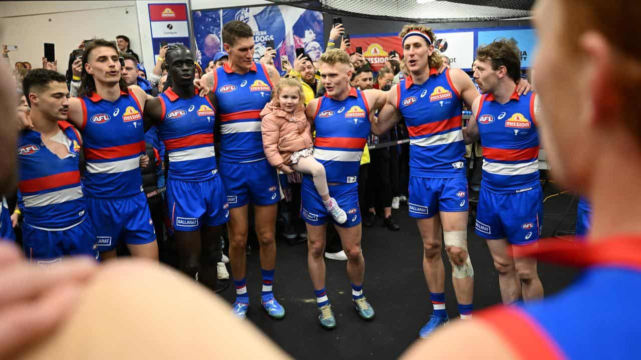 Western Bulldogs players singing.