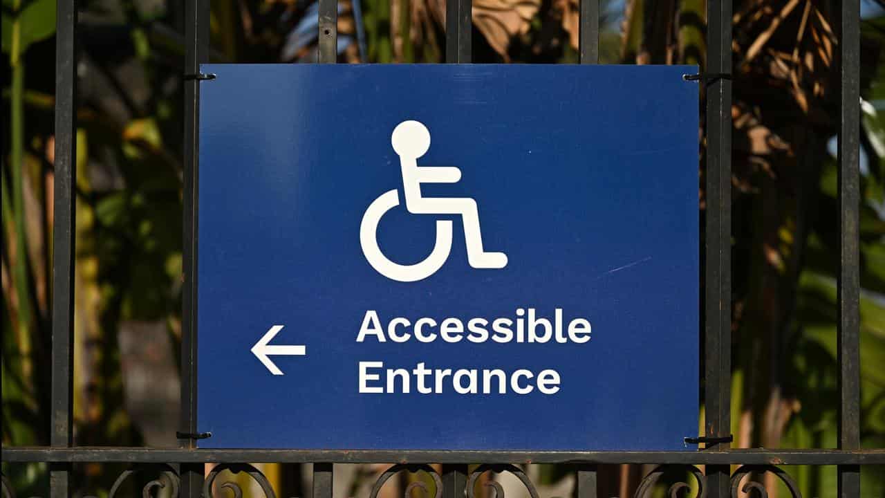 Accessible entrance sign