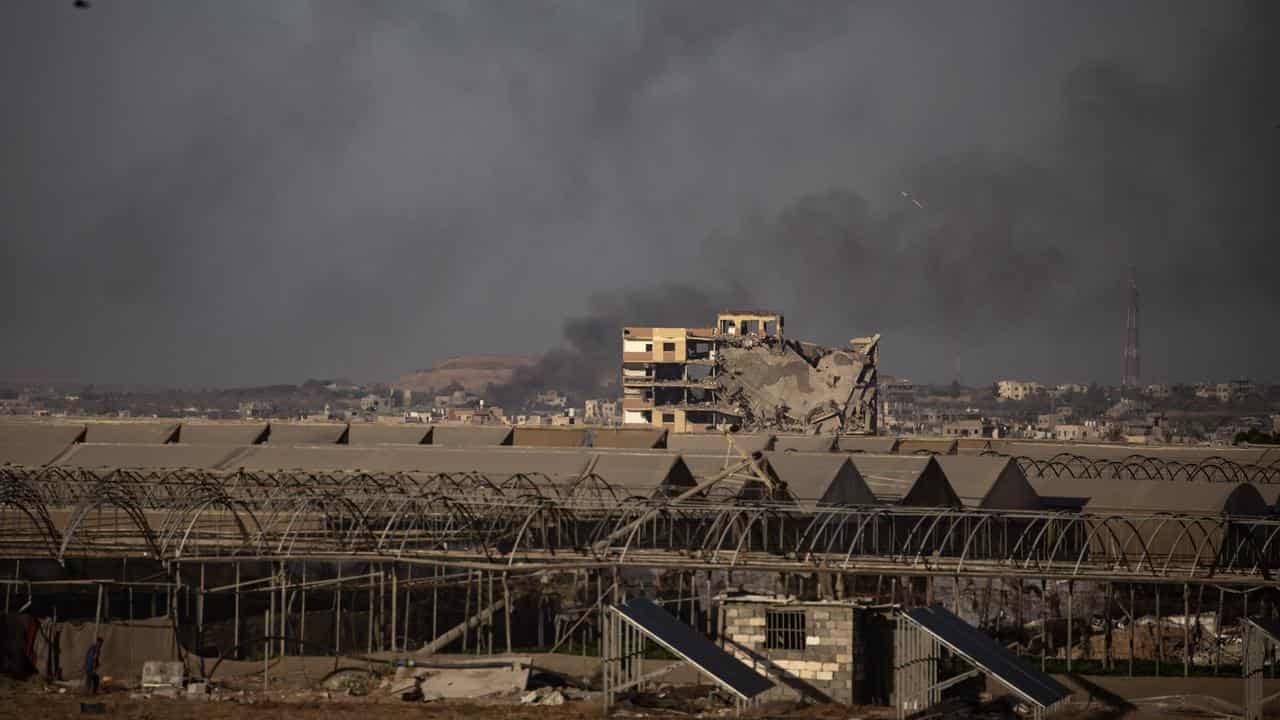 Smoke rises following an Israeli air strike in Khan Yunis, Gaza