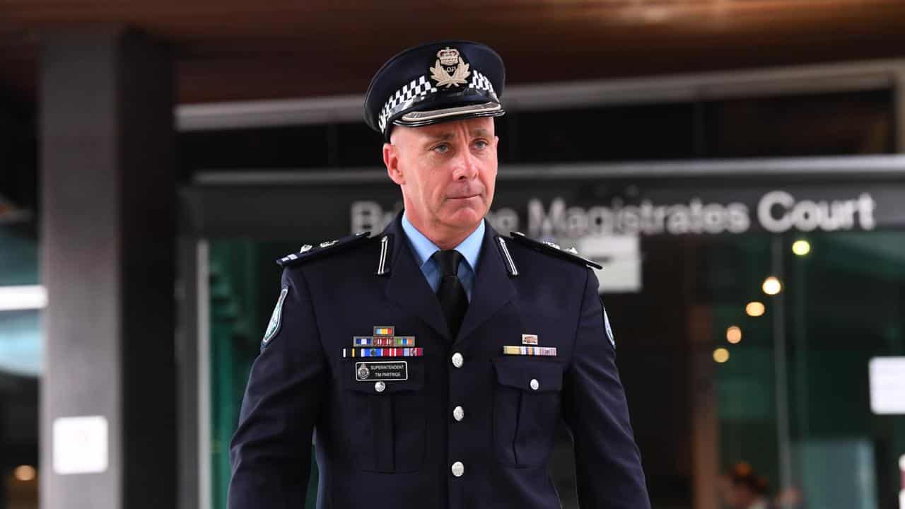 Superintendent Tim Partridge leaves the Wieambilla inquest