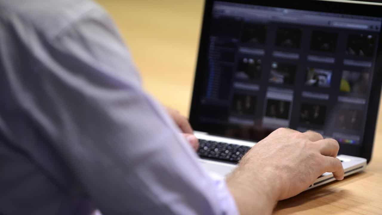 A man uses a laptop computer (file image)