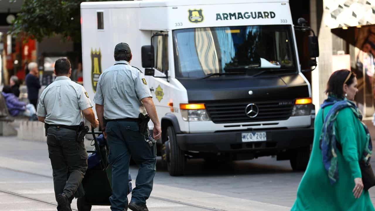 An Armaguard van and workers (file image)