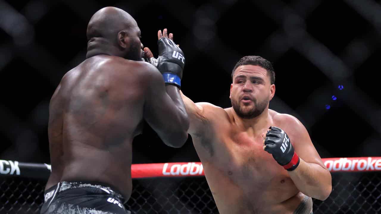 Australia's Tai Tuivasa (right) and  Suriname's Jairzinho Rozenstruik.