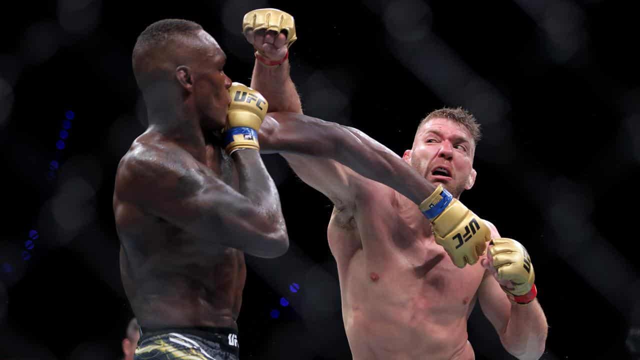 Dricus du Plessis and Israel Adesanya in action.