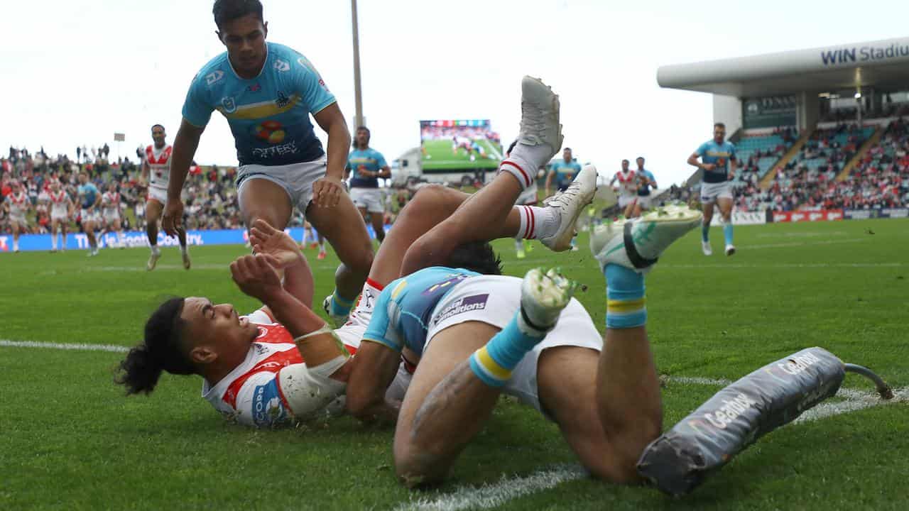 Christian Tuipulotu scores.