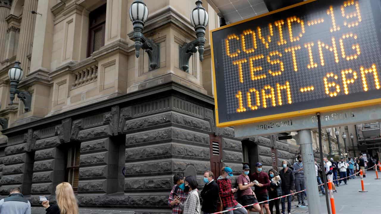 People waiting for COVID-19 testing at Melbourne Town Hall.