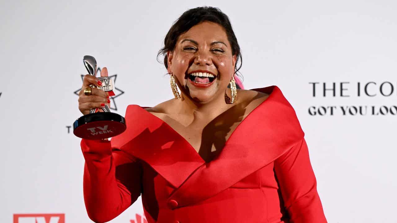 Deborah Mailman poses for a photograph after winning Best Lead Actress