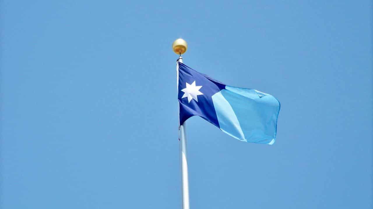 New Minnesota flag raised on Statehood Day 2024.