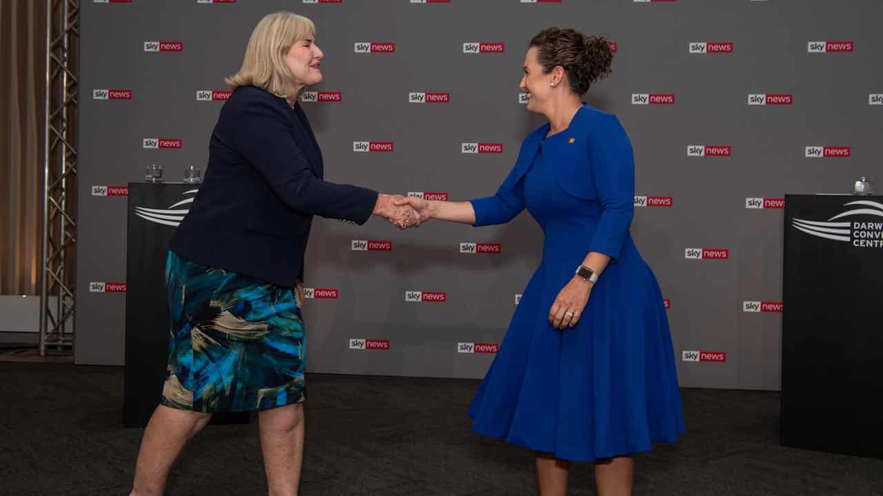 Eva Lawler and Lia Finocchiaro shake hands