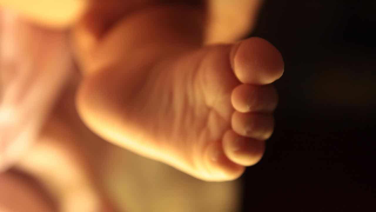 A photo of a baby's foot.