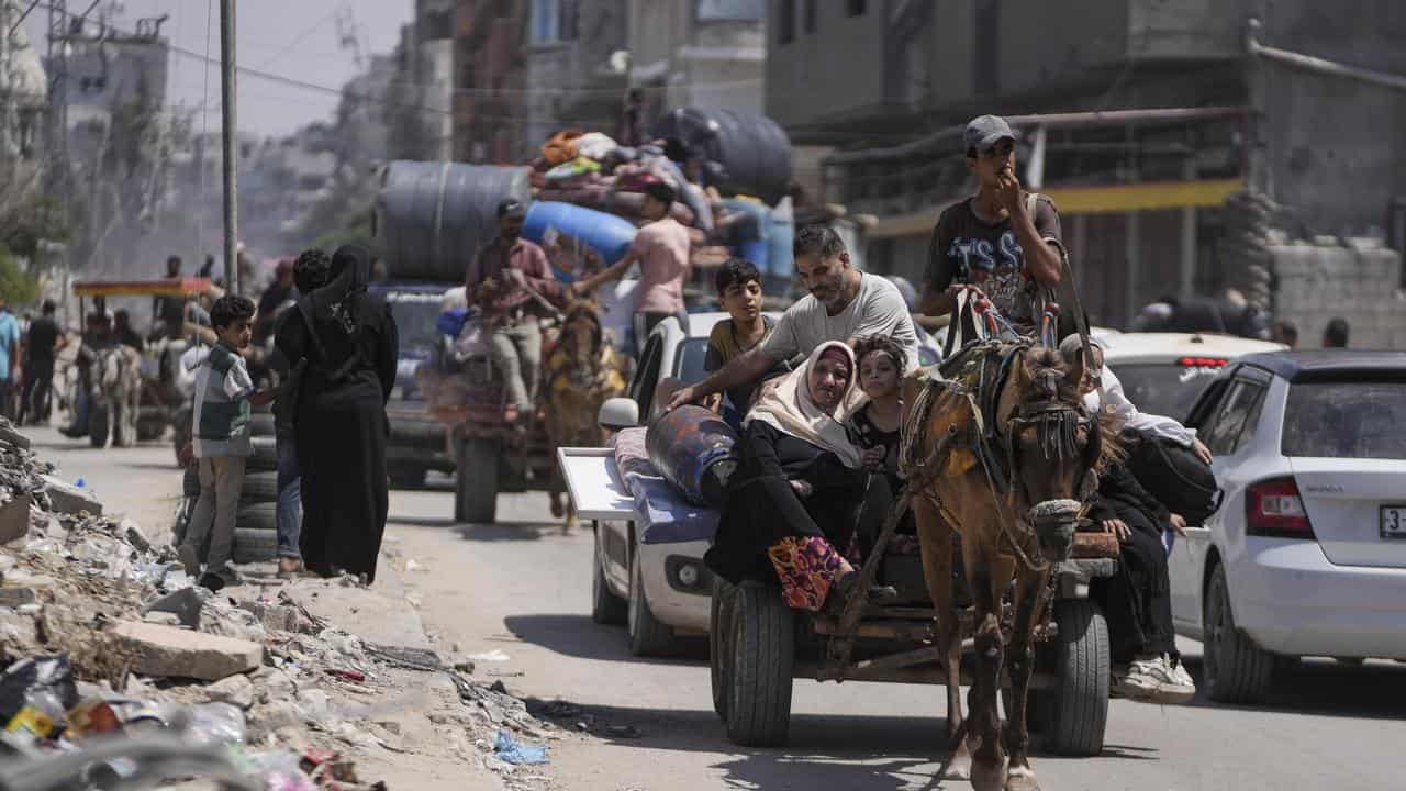 Palestinians evacuate Maghazi refugee camp in the central Gaza Strip