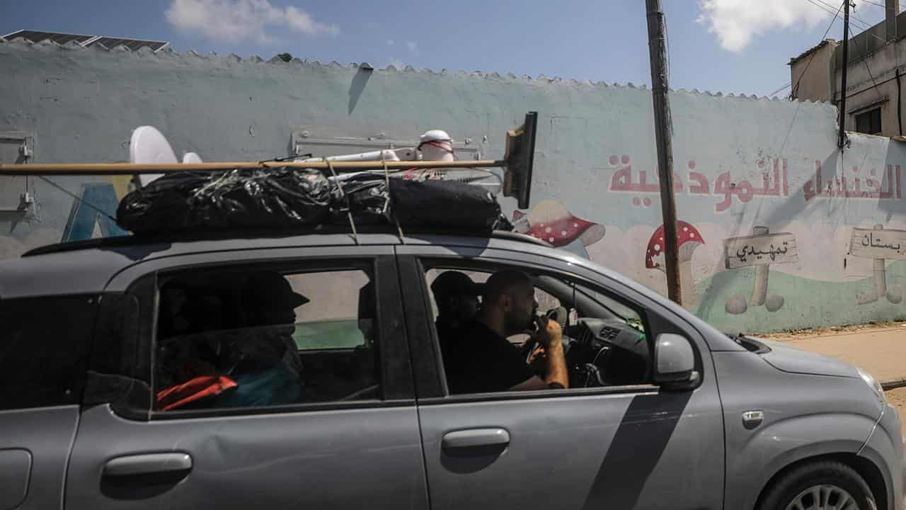 Palestinians fleeing Deir Al Balah in Gaza