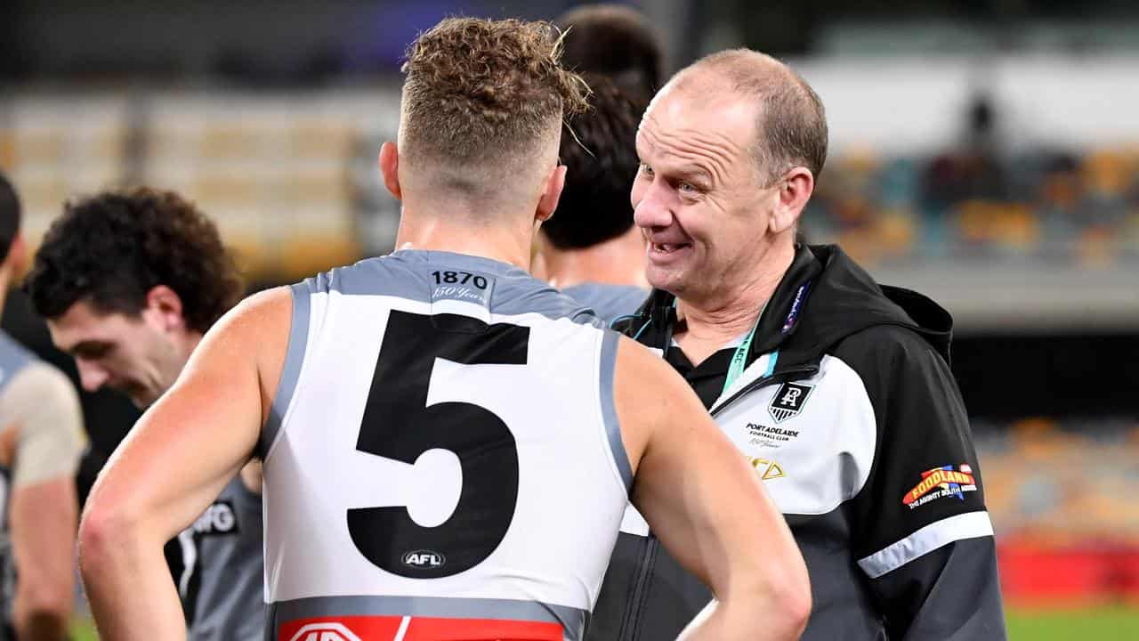 Power coach Ken Hinkley talking to Dan Houston