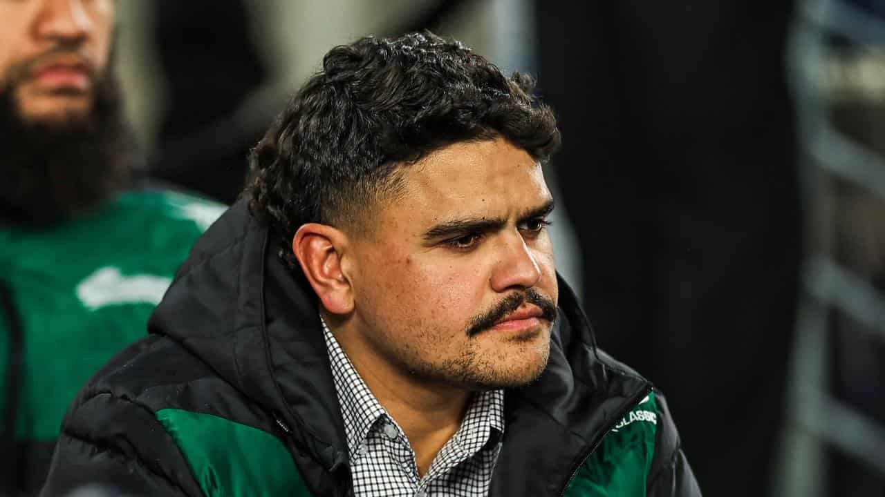 Latrell Mitchell in the stands at an NRL game