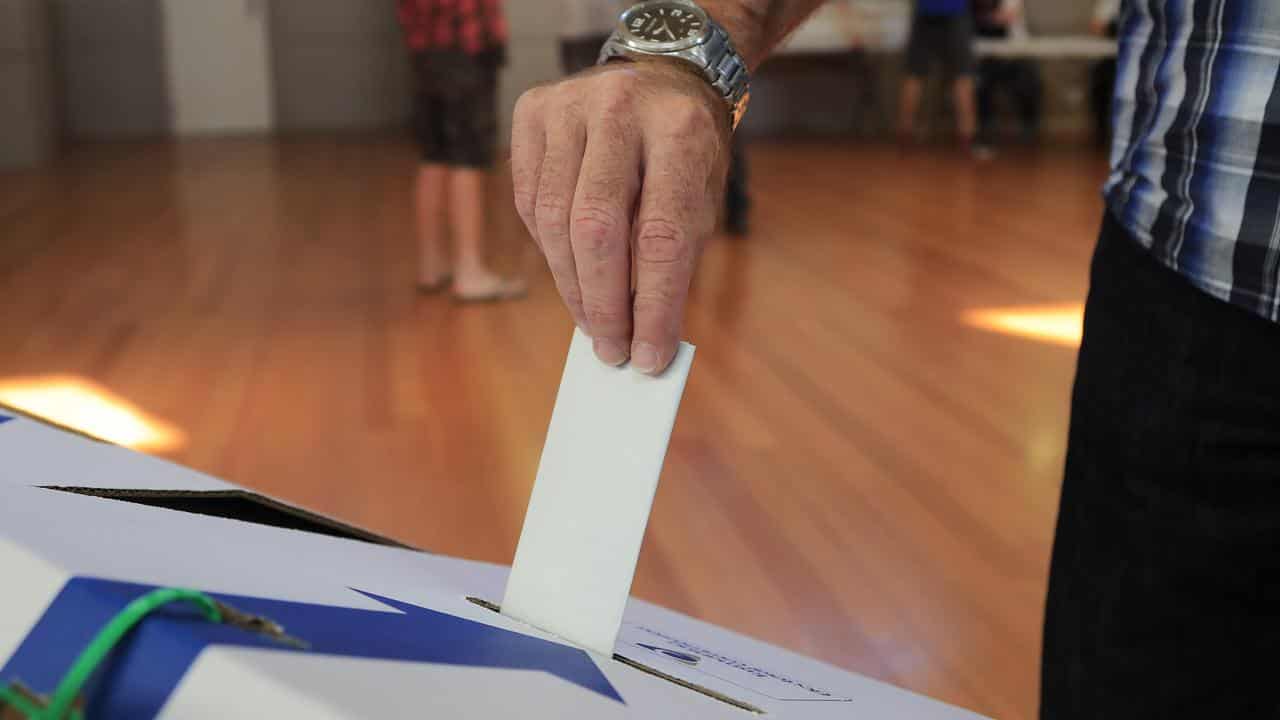 File photo of voter casting ballot.