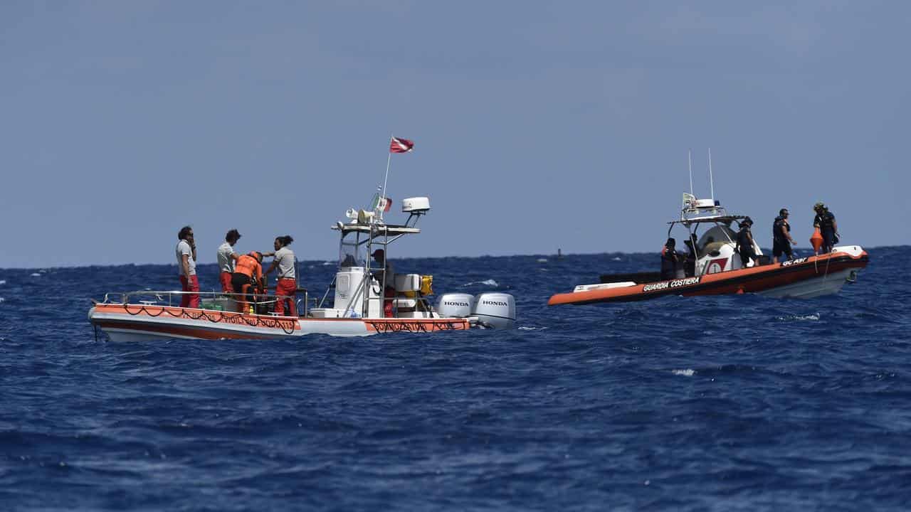 Emergency boats and crew off Porticello in southern Italy