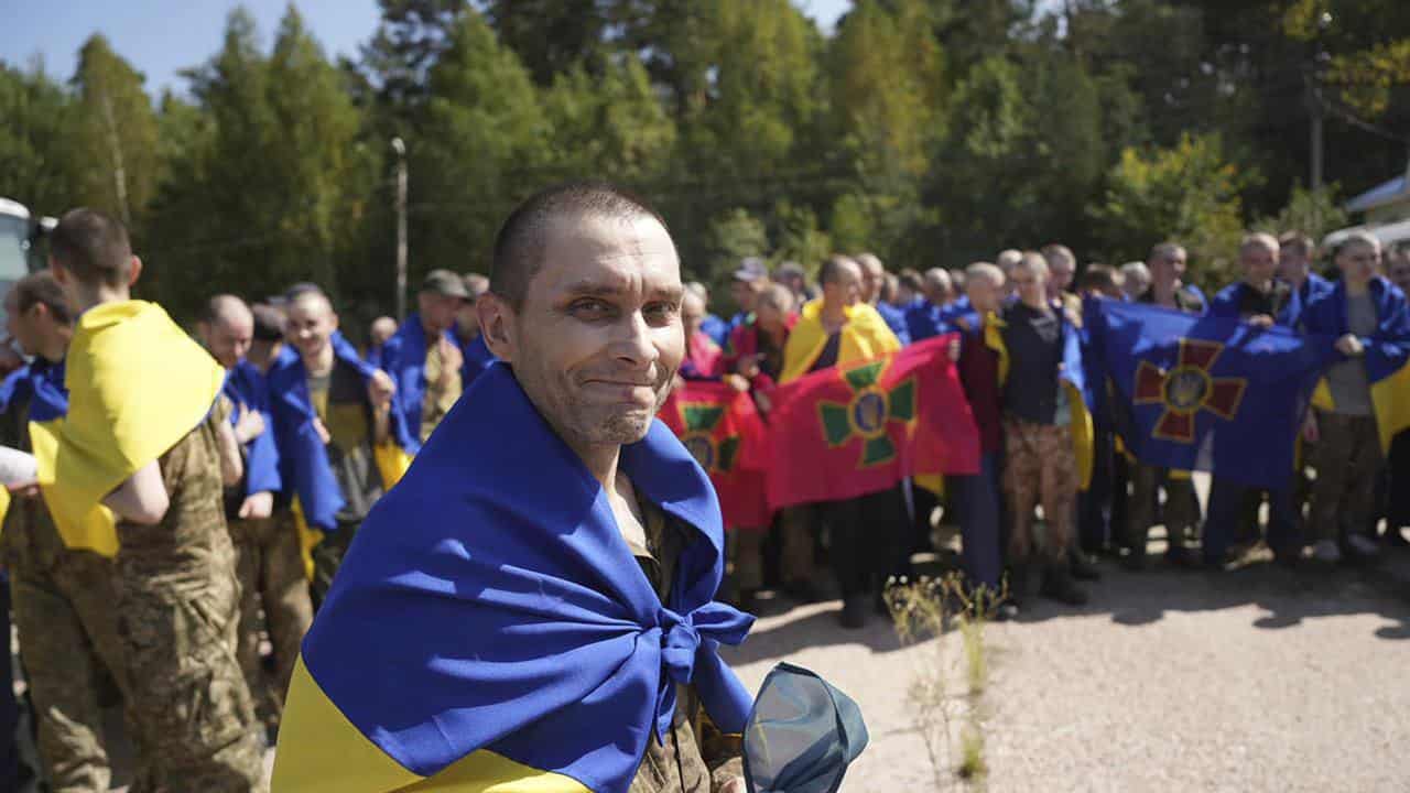 A Ukrainian prisoner of war smiles