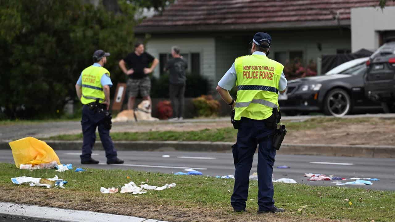 Scenes after a two-vehicle crash in Engadine, Sydney