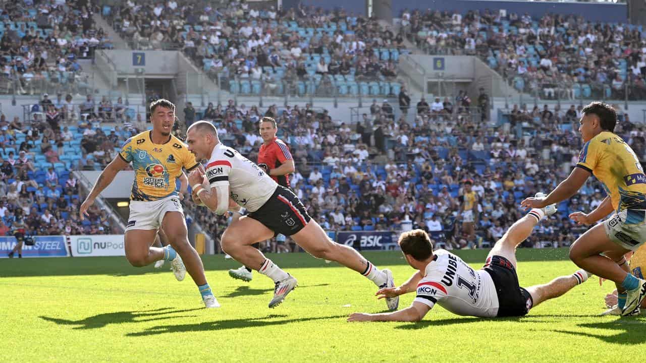 Angus Crichton scores a try.