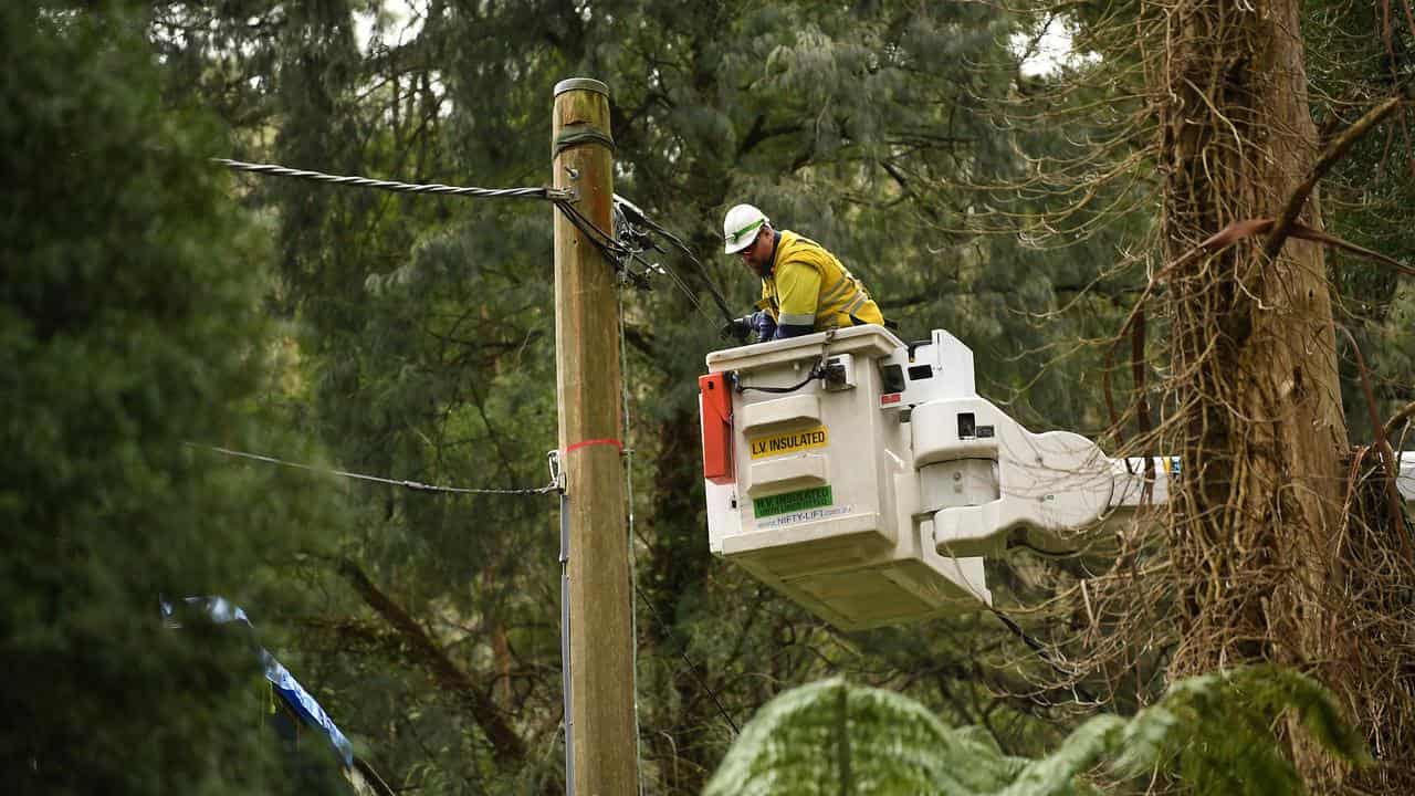 Crew work to restore to power lines