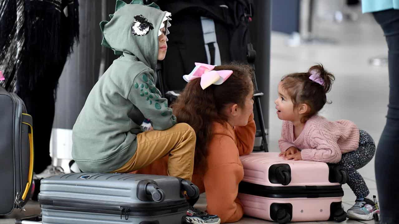 Children waiting for a flight.