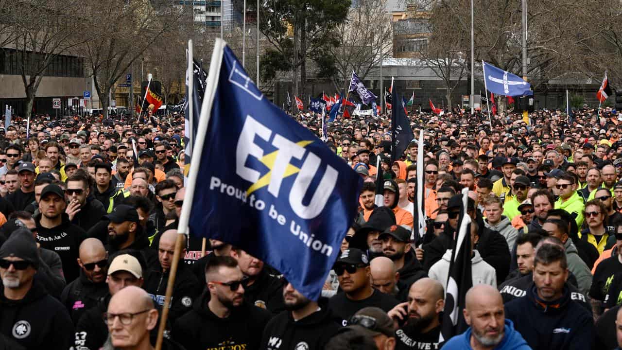 Unionists march at a CFMEU rally in Melbourne