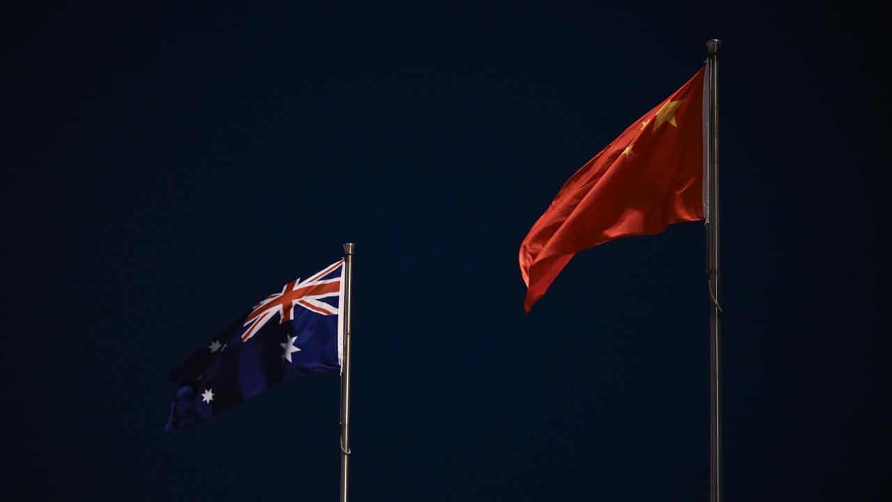 The national flags of Australia and China