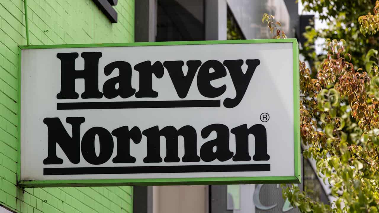 A Harvey Norman sign.