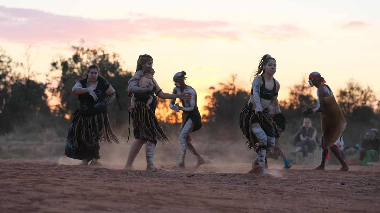 Traditional owners dance.