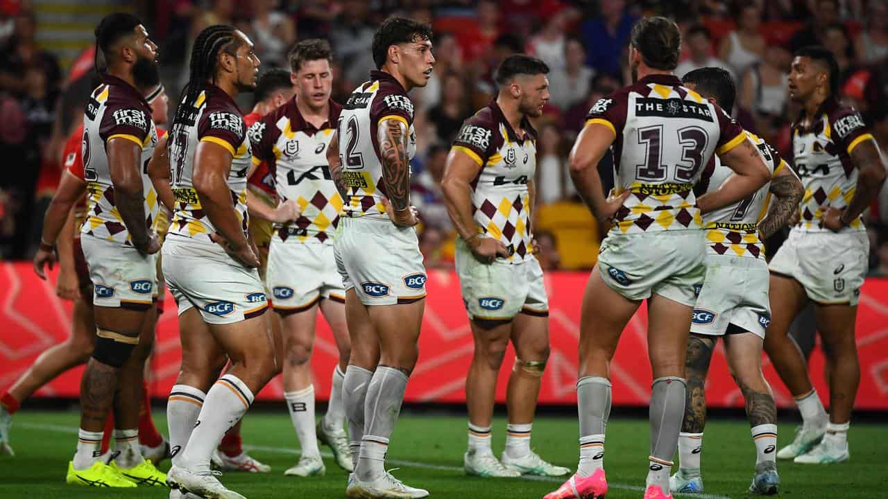 Disappointed Brisbane players.