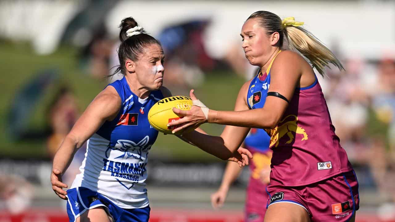 Emma Kearney (left) put plenty of pressure on Brisbane's Taylor Smith.