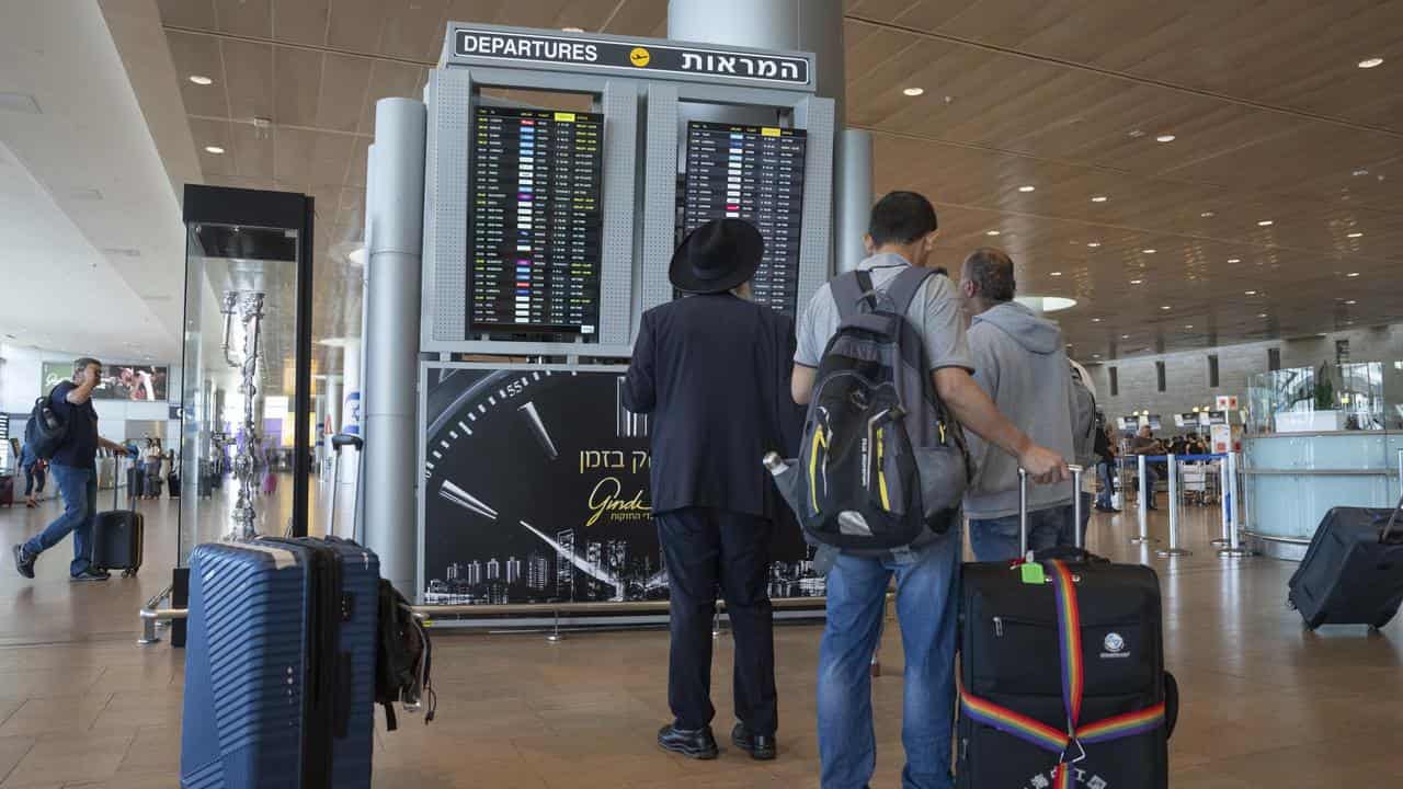 Travellers at Ben Gurion International Airport near Tel Aviv, Israel