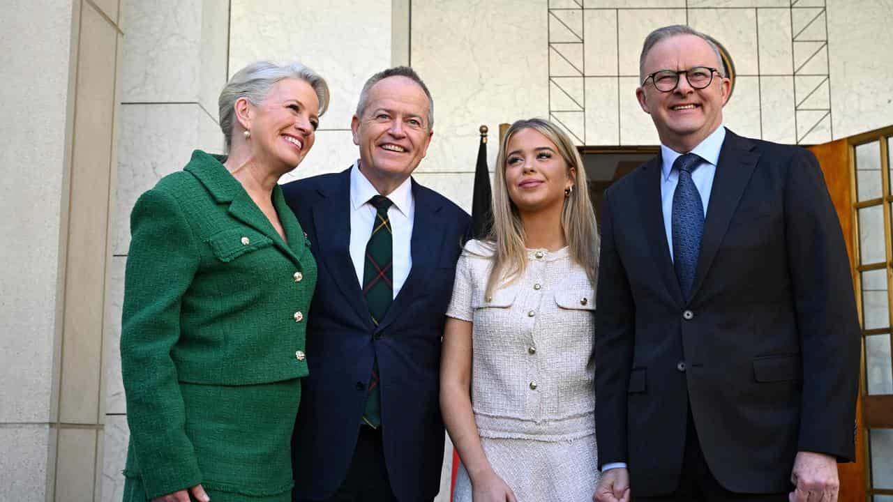 Bill Shorten with wife Chloe, daughter Clementine, and prime minister.