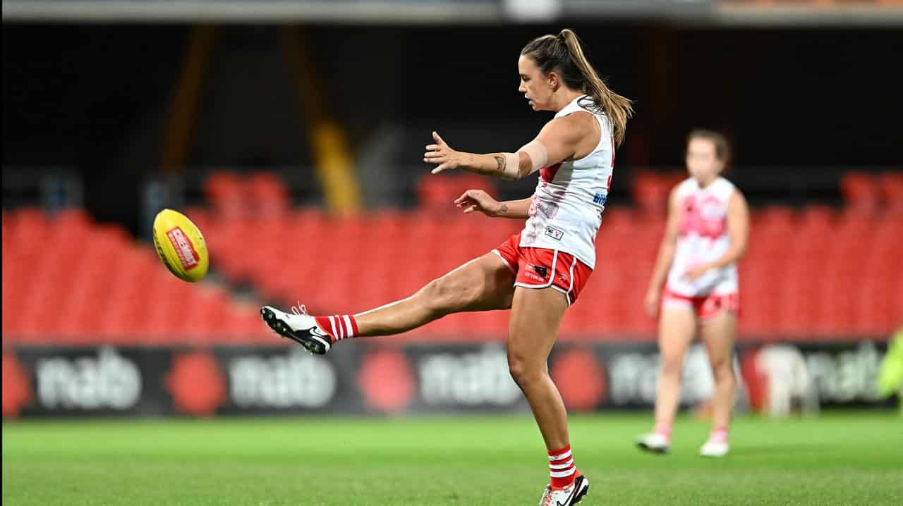 Chloe Molloy takes a kick.