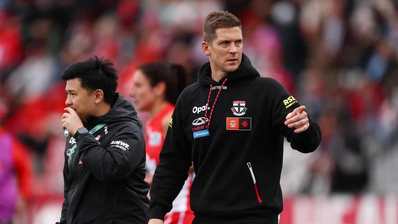 St Kilda AFLW coach Nick Dal Santo (right).