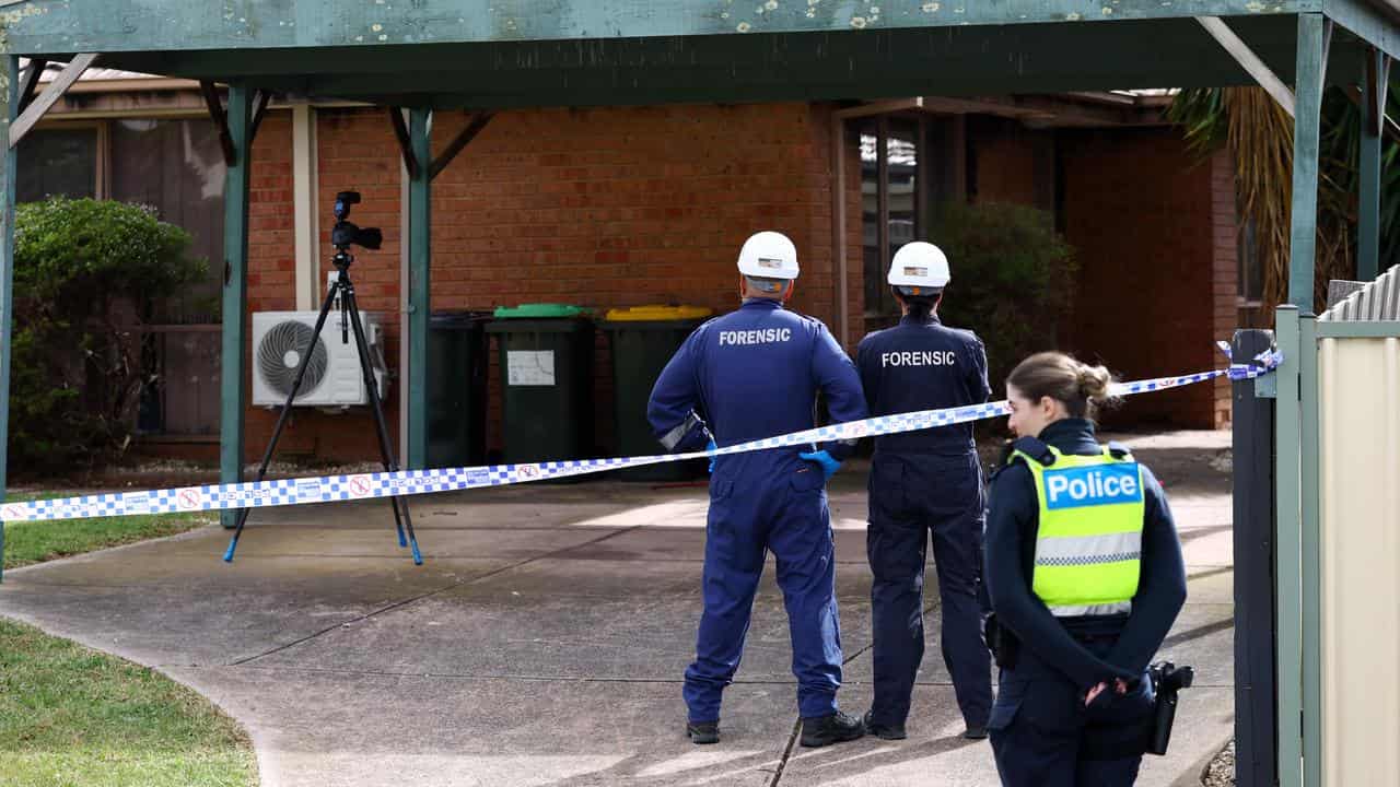 Emergency services at the scene of a house fire in Melbourne