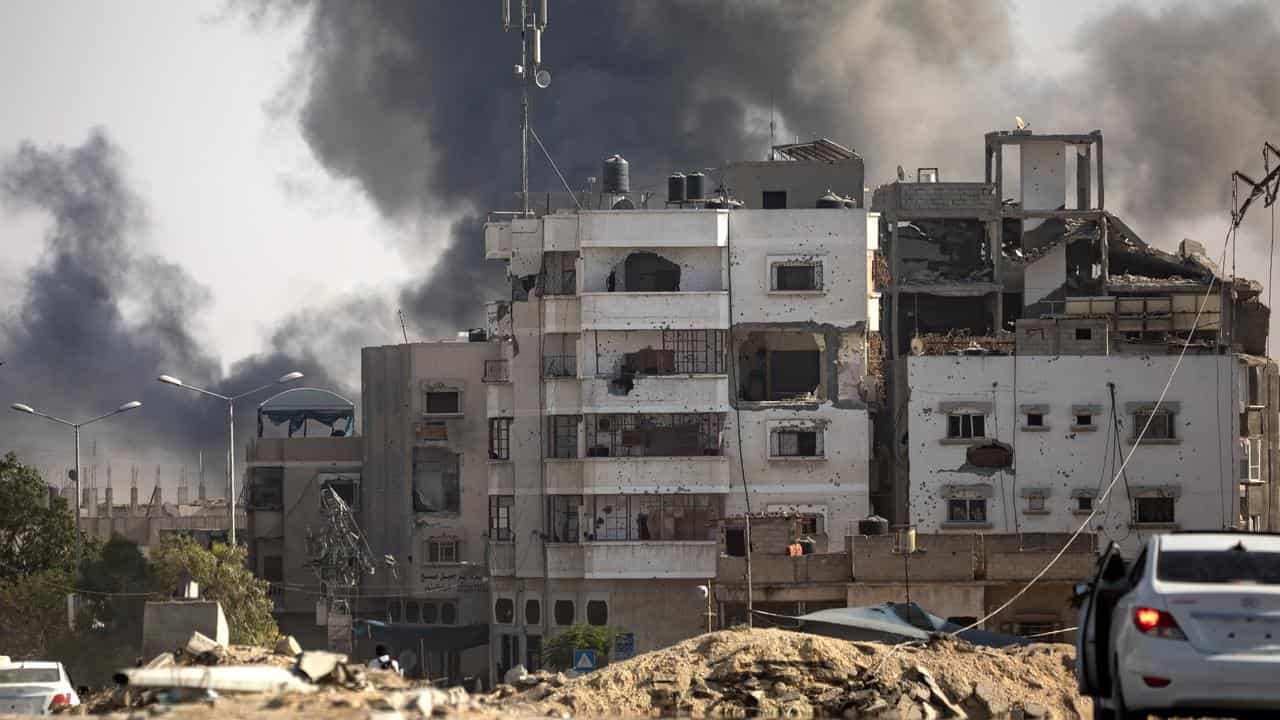 Smoke rises following an Israeli air strike in Khan Younis, Gaza Strip